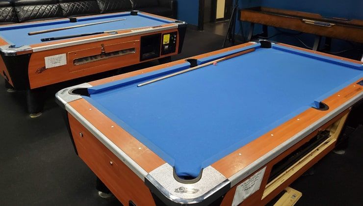 Pool table in the lounge at Cloud 9 Vapes on Airport Blvd in Mobile, AL