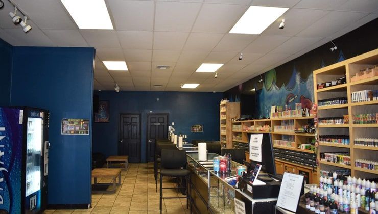 Aisle between the e-liquid shelving and the counter at Cloud 9 Vapes Hillcrest in Mobile, AL
